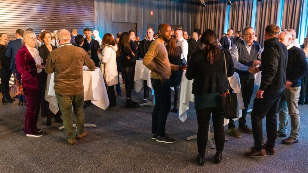 Guests mingling at the Festive Evening